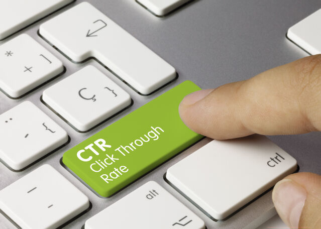 closeup of fingertip touching a key on a keyboard that says CTR click through rate