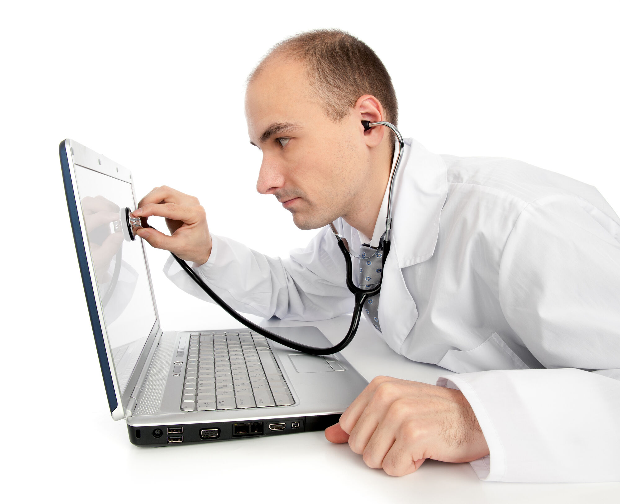 Doctor with stethoscope checking a laptop's health