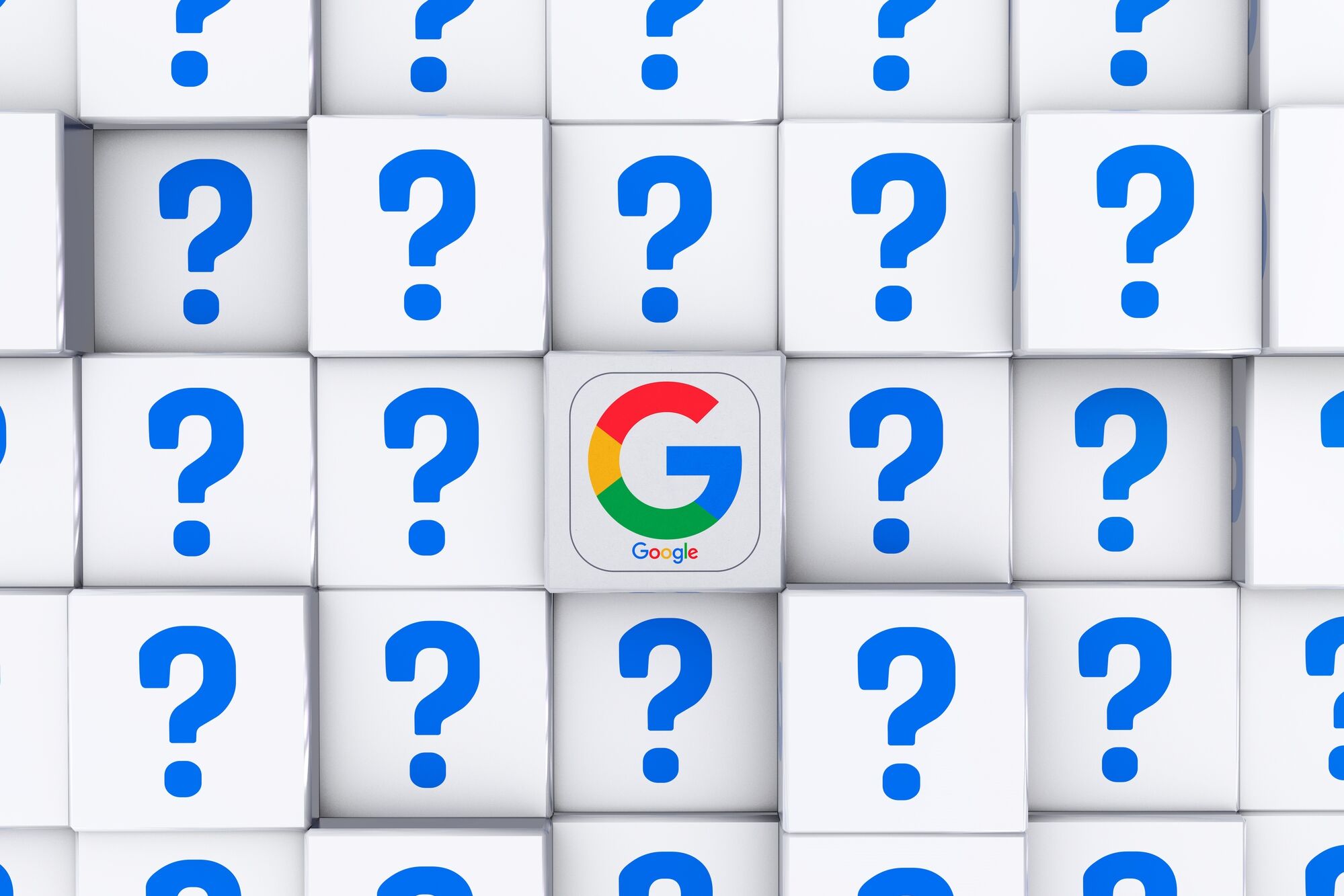several blue question marks surrounding the Google logo