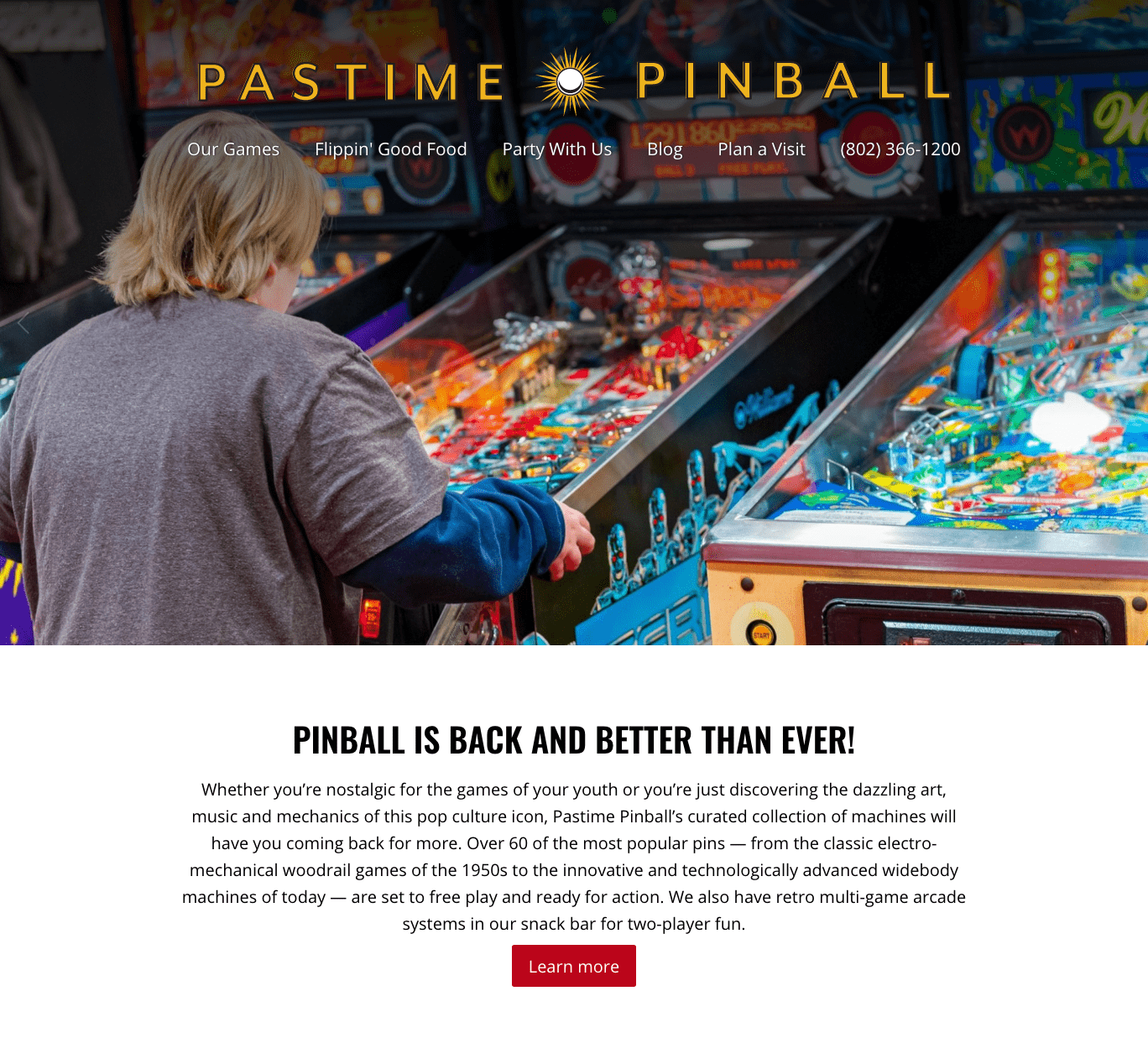 A person plays pinball at Pastime Pinball arcade, surrounded by colorful machines