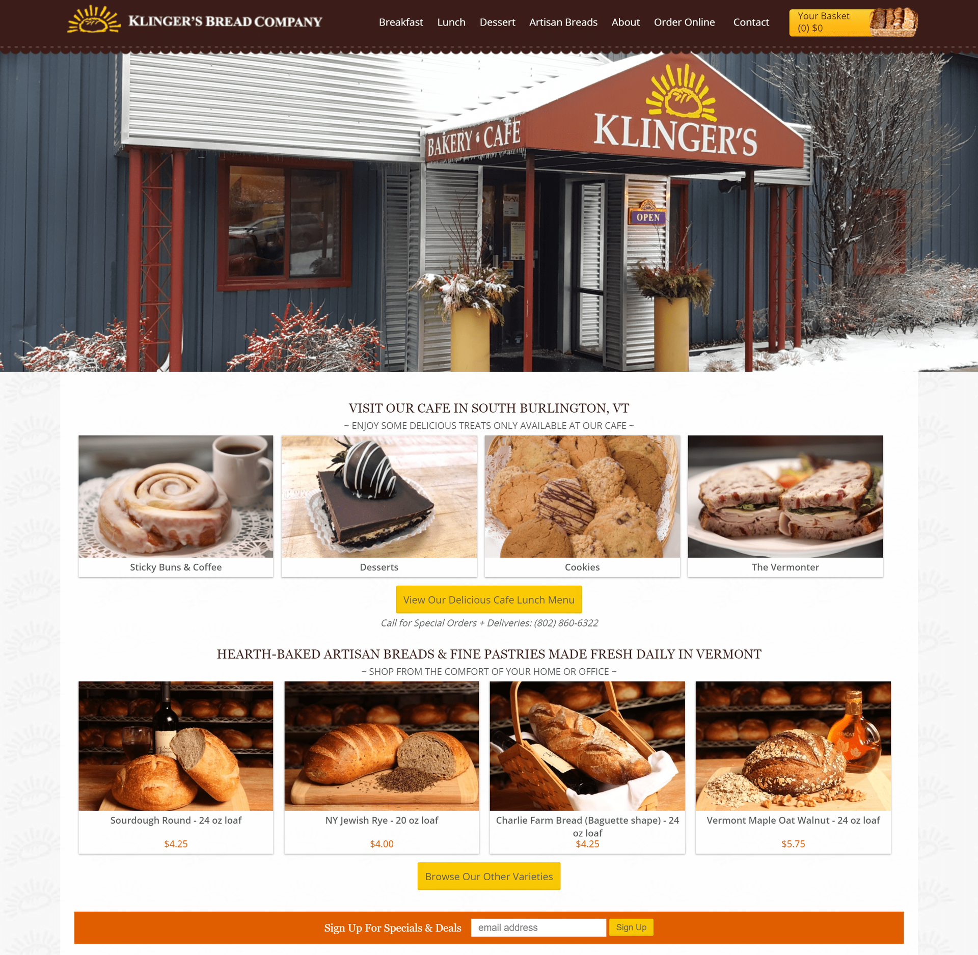 Exterior of Klinger&rsquo;s Bakery Cafe with menu items and bakery products displayed