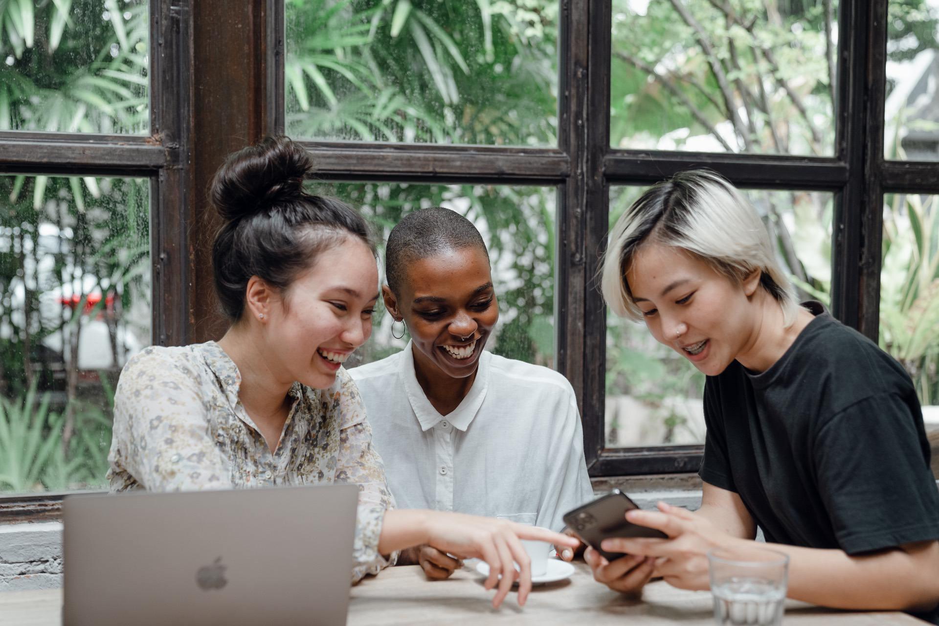 Group of friends with laptop