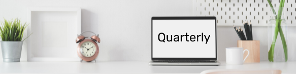 Laptop screen that says quarterly