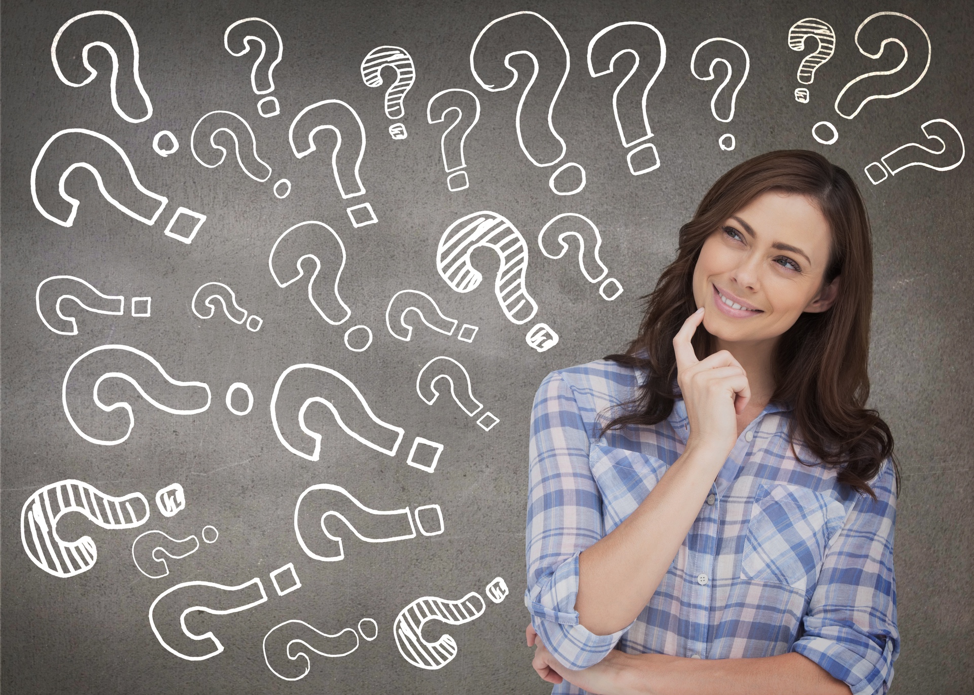 young woman thinking with question marks surrounding her
