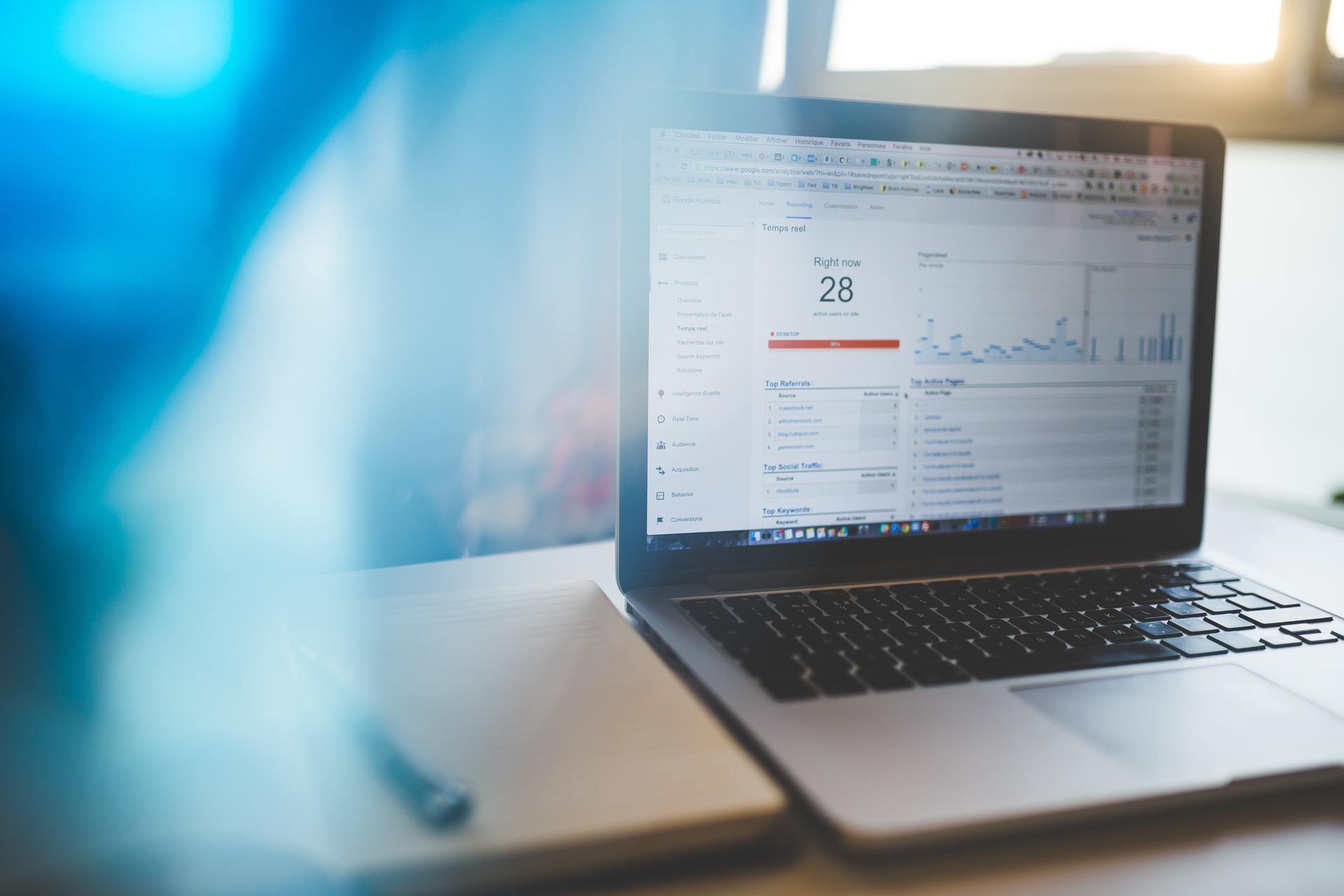 Laptop displaying analytics dashboard with real-time user data